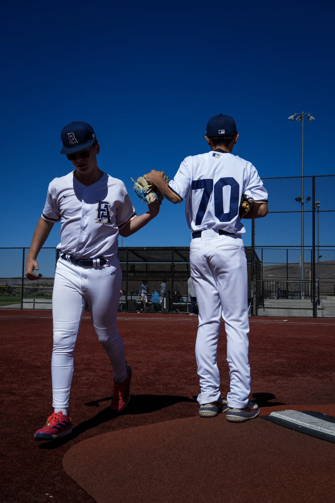 Two PA players together on the field